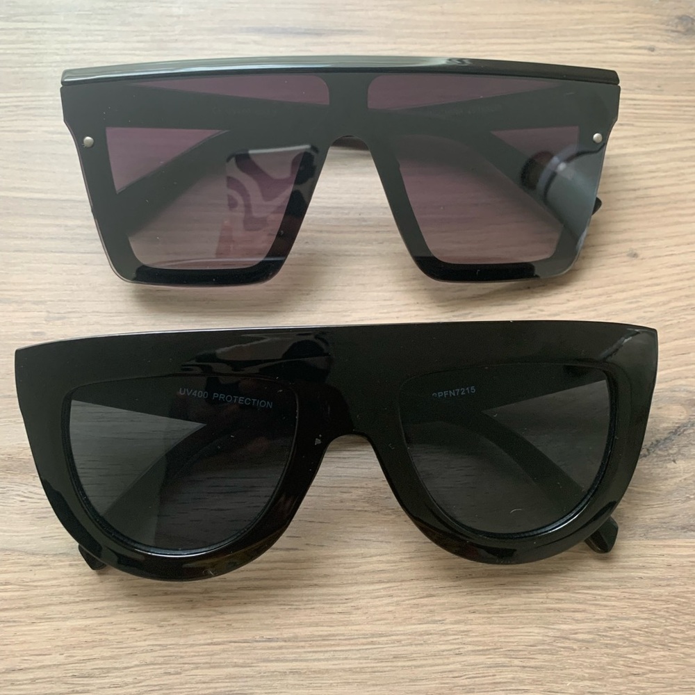 A pair of 2 trendy no-name sunglasses.